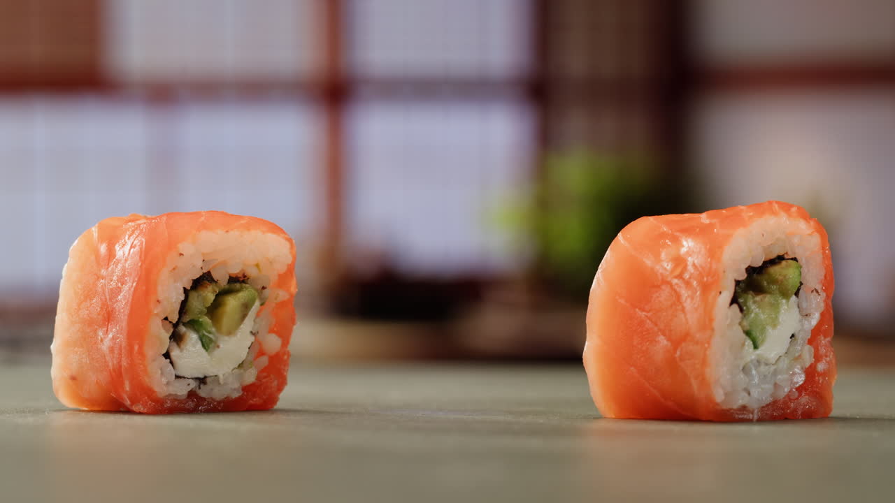 Salmon Sushi Rolls with Chopsticks