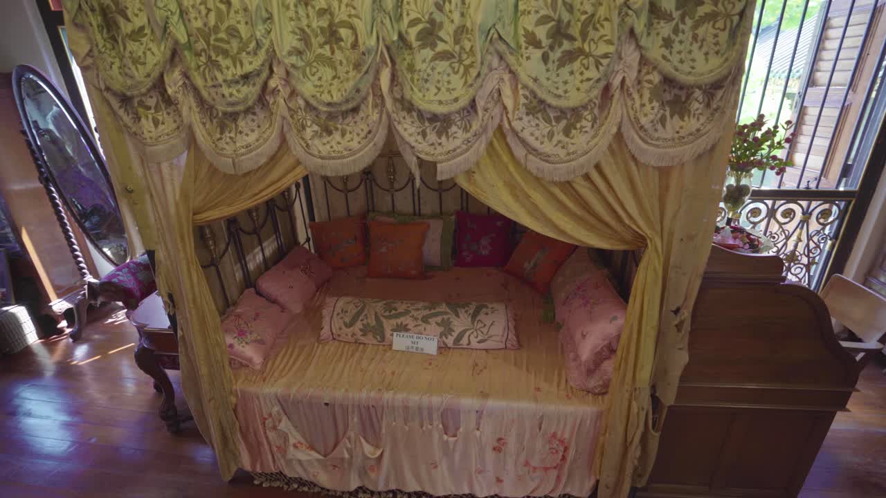A Bedroom In Pinang Peranakan Mansion In Penang, Malaysia With An Antique Dressing Table With Mirror And A Study Table With Small Bed In The Middle - Panoramic Shot