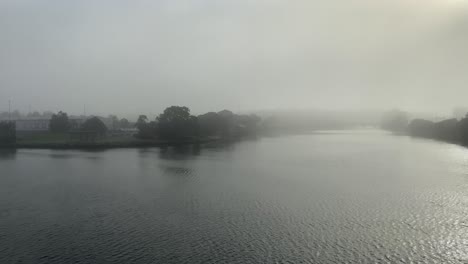 River-or-lake-covered-with-thick-fog-in-Sydney,-Australia