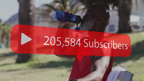 animation of increasing numbers of subscribers over fit african american senior man drinking water