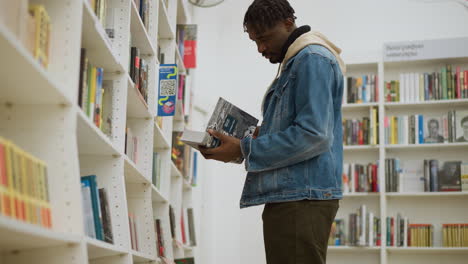 student browsing bookshelf in modern library, carefully selecting books from shelves, exploring educational materials in quiet atmosphere, surrounded by rows of colorful book spines
