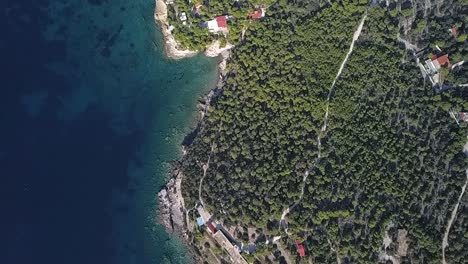 Forward,-slow-motion,-straight-down-drone-shot-over-the-island-of-Aigina-in-Greece