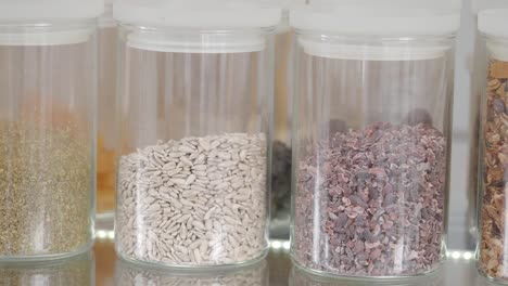 assorted healthy snacks in glass jars