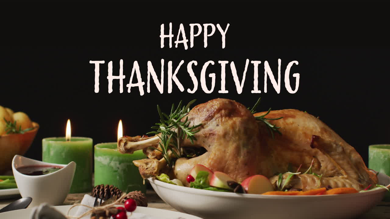 Animation of happy thanksgiving text and dinner and candles on black background