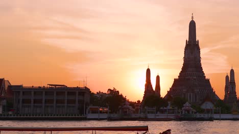 time-lapse of sunset behind iconic temple