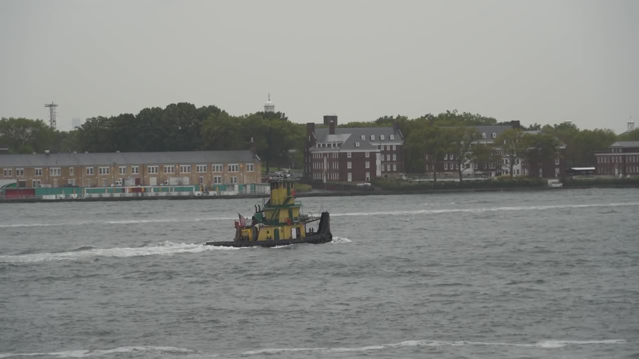 Governors Island New York City with boat on the Hudson River
