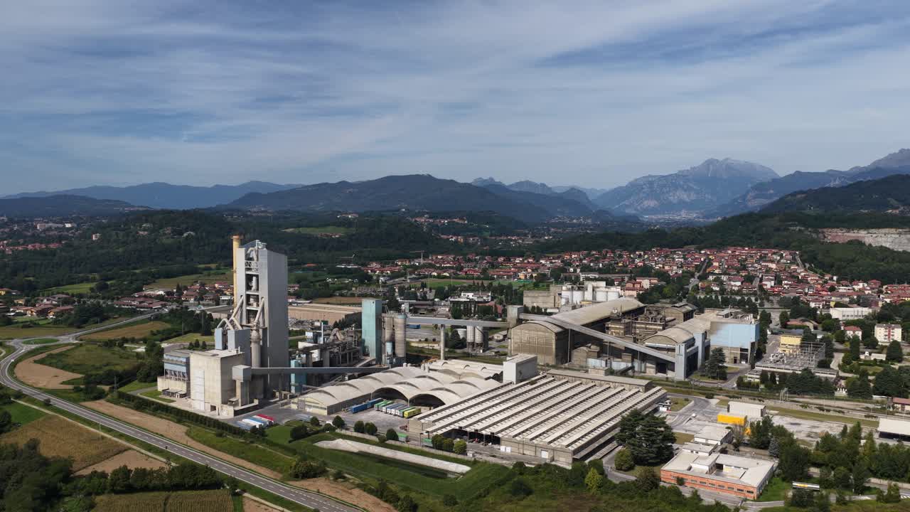 Cement factory in the area of Bergamo, Italy. Construction materials. Aerial drone video