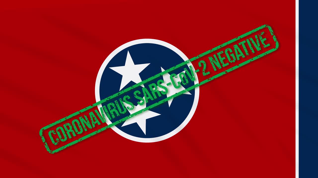 el estado estadounidense de tennessee balanceando la bandera con sello verde de libertad del coronavirus, bucle