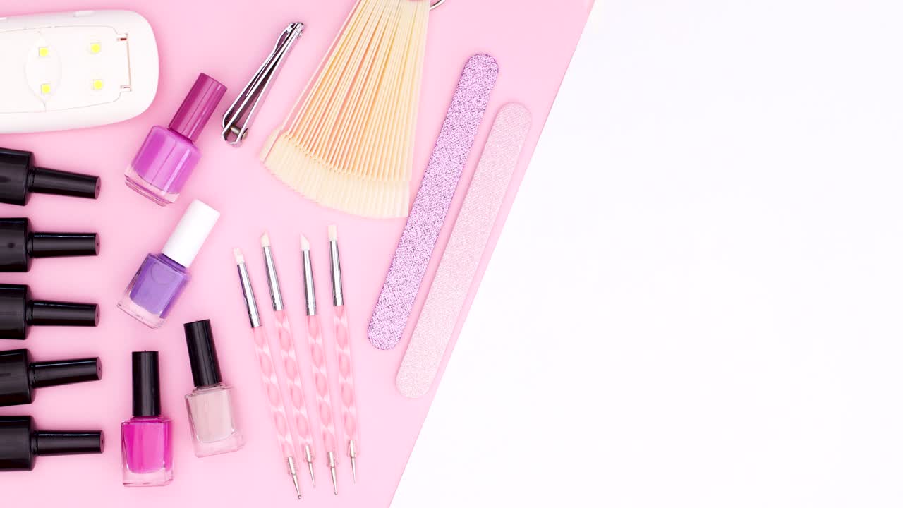 Manicure tools moving on pink side of pink white theme Stop motion