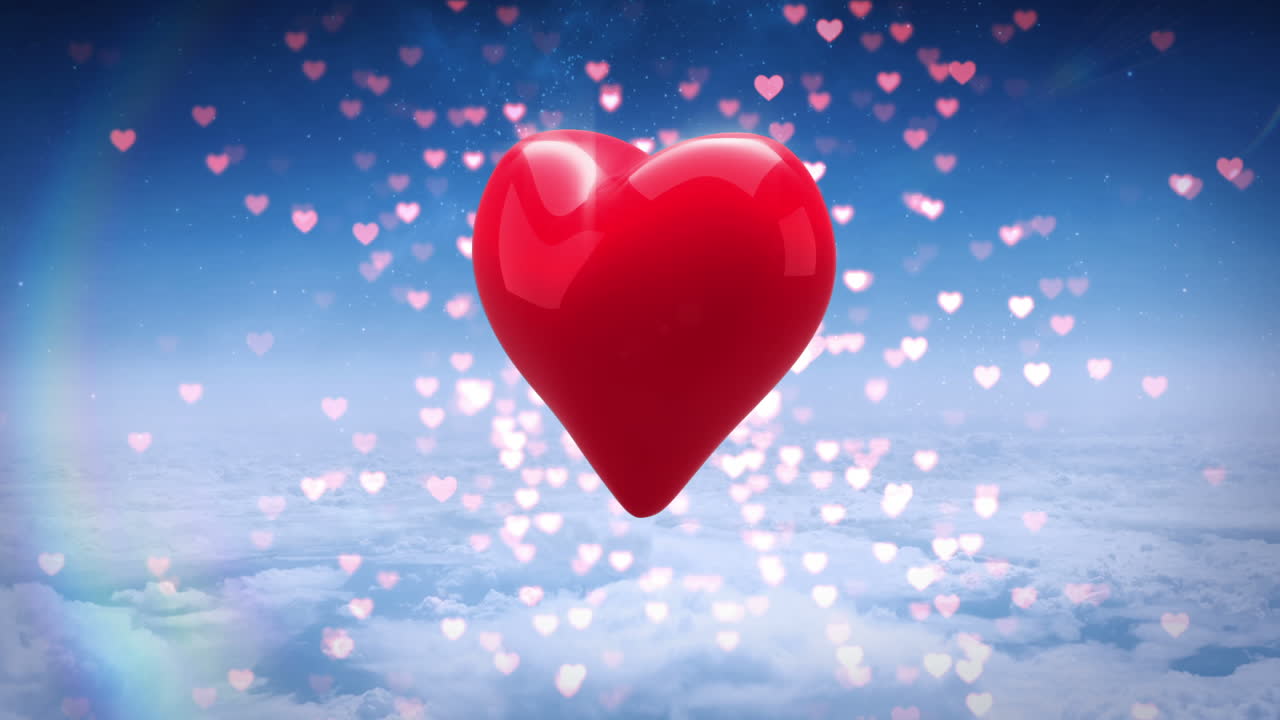 красное сердце поворачивается над голубым небом