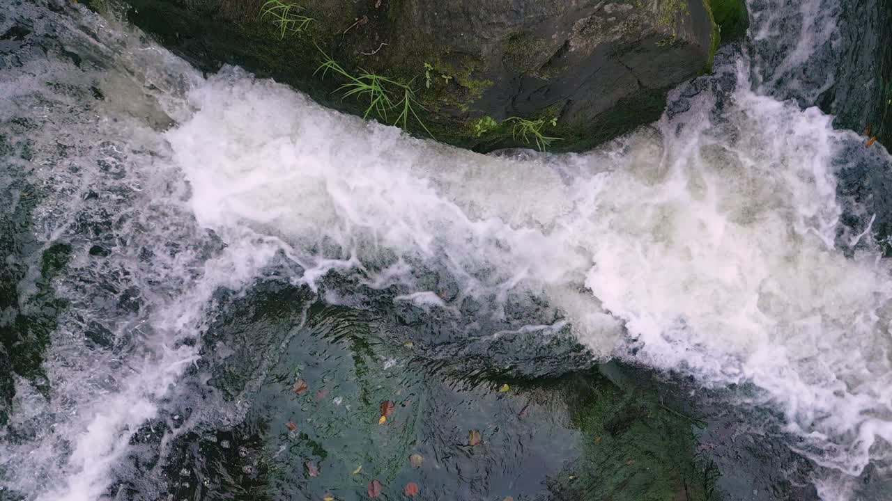 Top View Of A Fast Flowing Stream Of A Rocky River