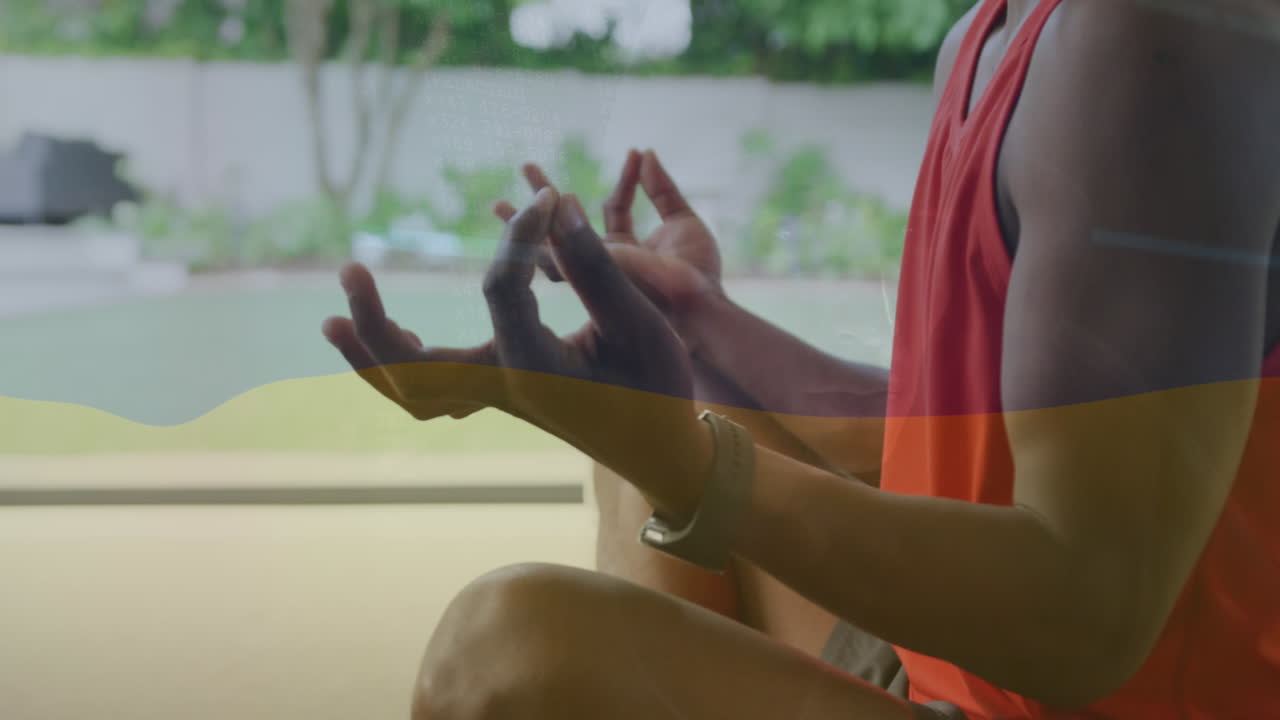 animación de la bandera de alemania sobre el hombre afroamericano meditando