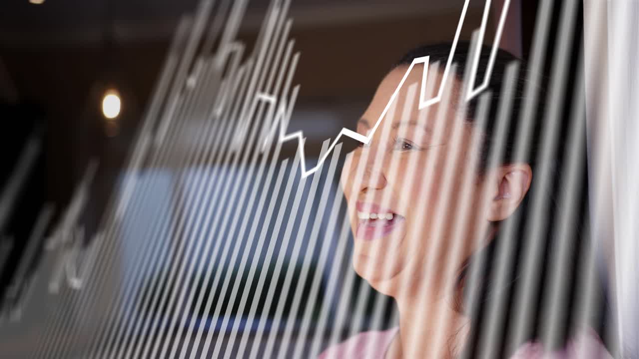 Mature woman watching rising finance line chart from left window, smiling and reacting to growth