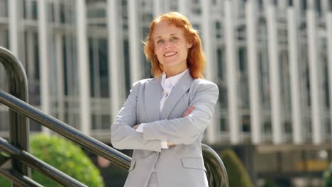 confident businesswoman in a city setting