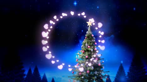 Pink-heart-shaped-fairy-lights-against-christmas-tree-and-shining-stars-at-night-sky