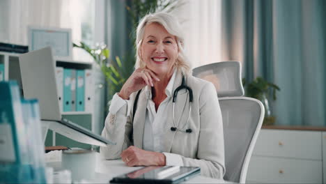 smiling female doctor in her office
