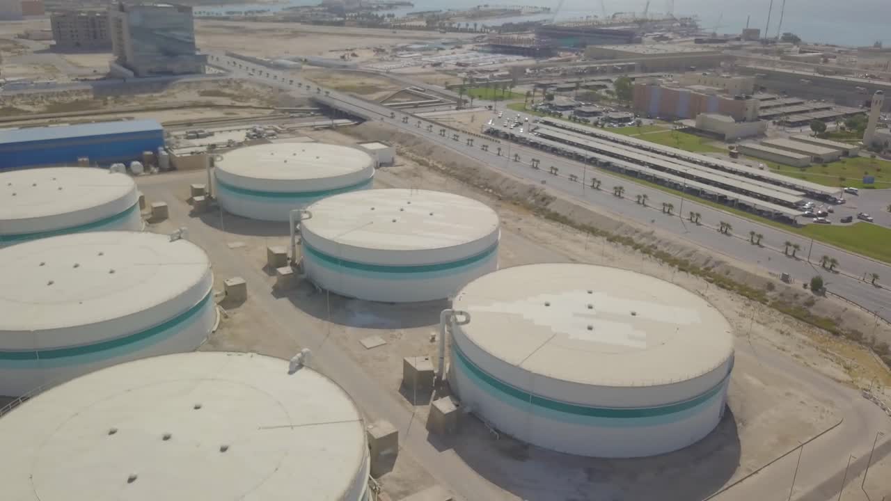 Very large storage tank silos with pipes (4K)