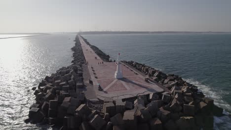 Aerial-shot-in-orbit-of-the-breakwater-in-beach-Miramar