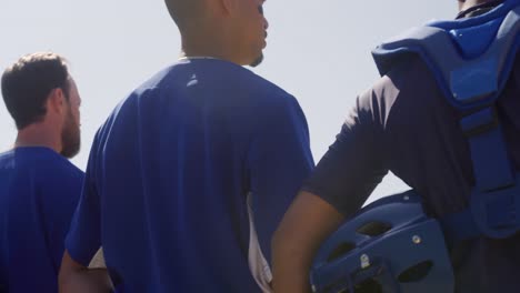 baseball players standing on line