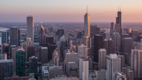 beautiful chicago skyline skyscrapers day to night aerial sunset timelapse