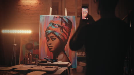 woman portrait painting in artist's studio