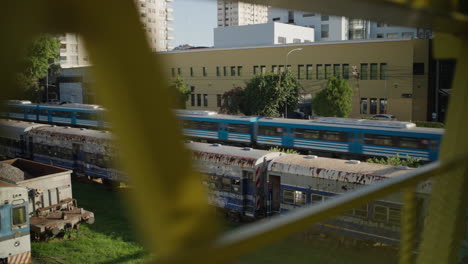 high angle train view from pedestrian bridge while traveling backward over segway