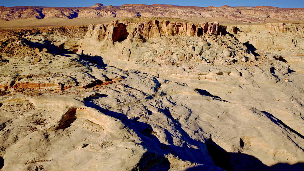 The desert breathes below—its canyons deep, its colors bold—as the Inspire 3 glides silently above.