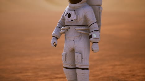 astronauta en la superficie de marte. planeta rojo cubierto de gas y roca