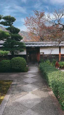 japanese garden pathway with traditional wooden gate