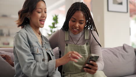 two friends using a smartphone together