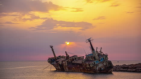 a sunset over the edro iii shipwreck off the coast of cyprus