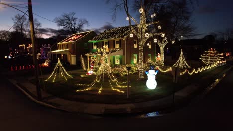 christmas lights drone slow rise dusk holiday cheer festive