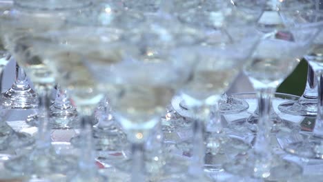 slide of glasses with champagne slow motion