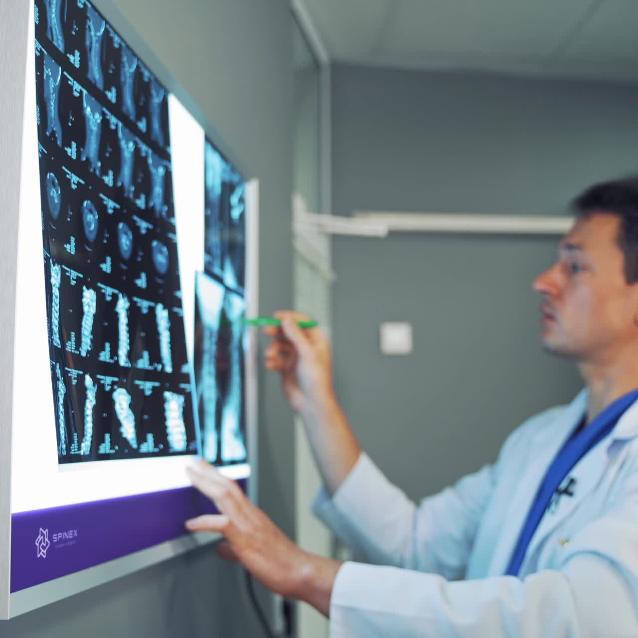 Doctor looking at x rays in hospital