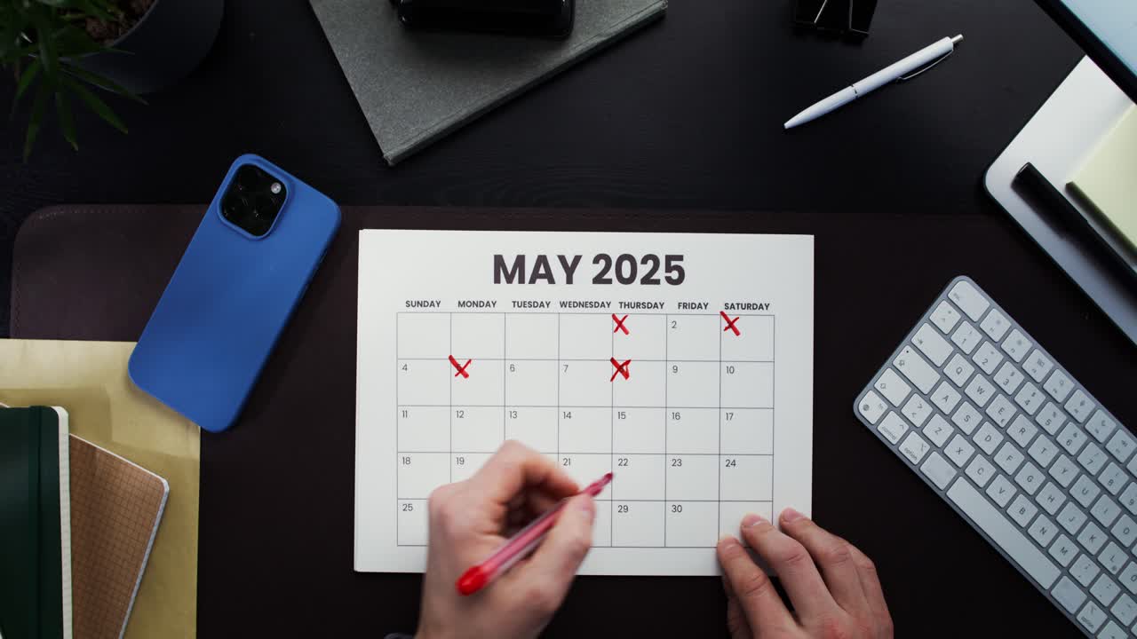 Marking appointments on a May 2025 calendar