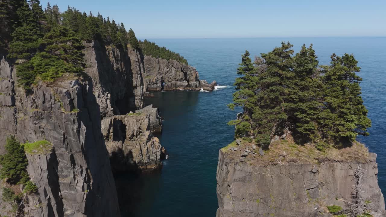 Flyover the rough Newfoundland rough coast in the North Atlantic in Canada