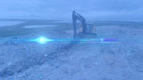 animation of glowing blue spot over digger in waste disposal site