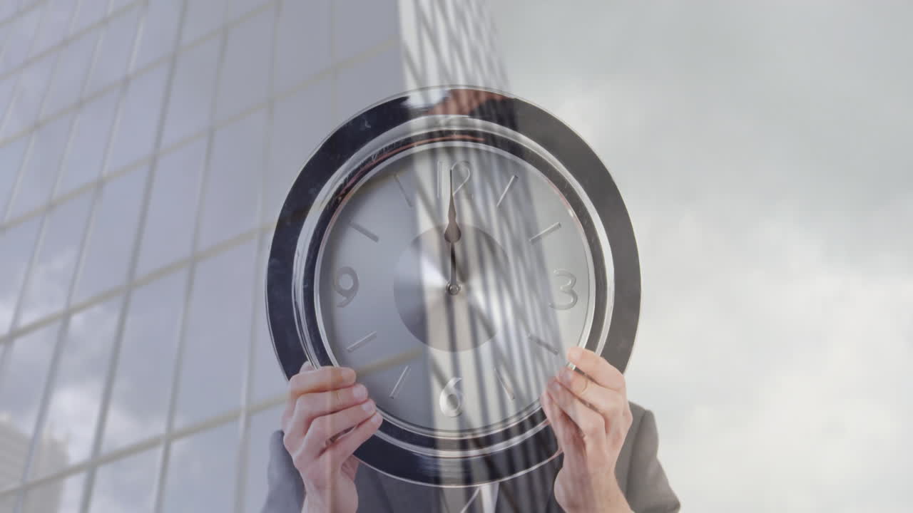 Holding clock, businessperson standing over animation of skyscraper reflecting sky