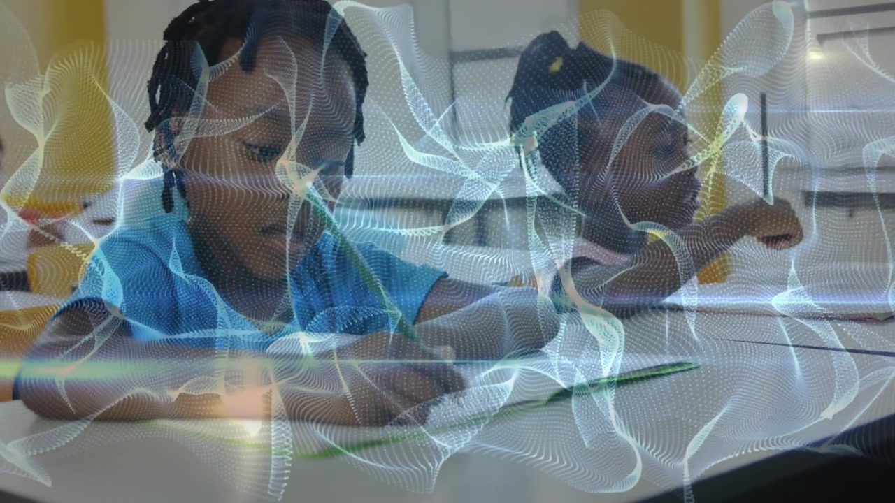 Two students being task-prompted, writing with pencils and finishing classwork under ribbon overlay
