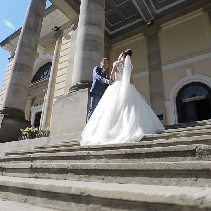 Elegant Wedding Couple Near The Old Building
