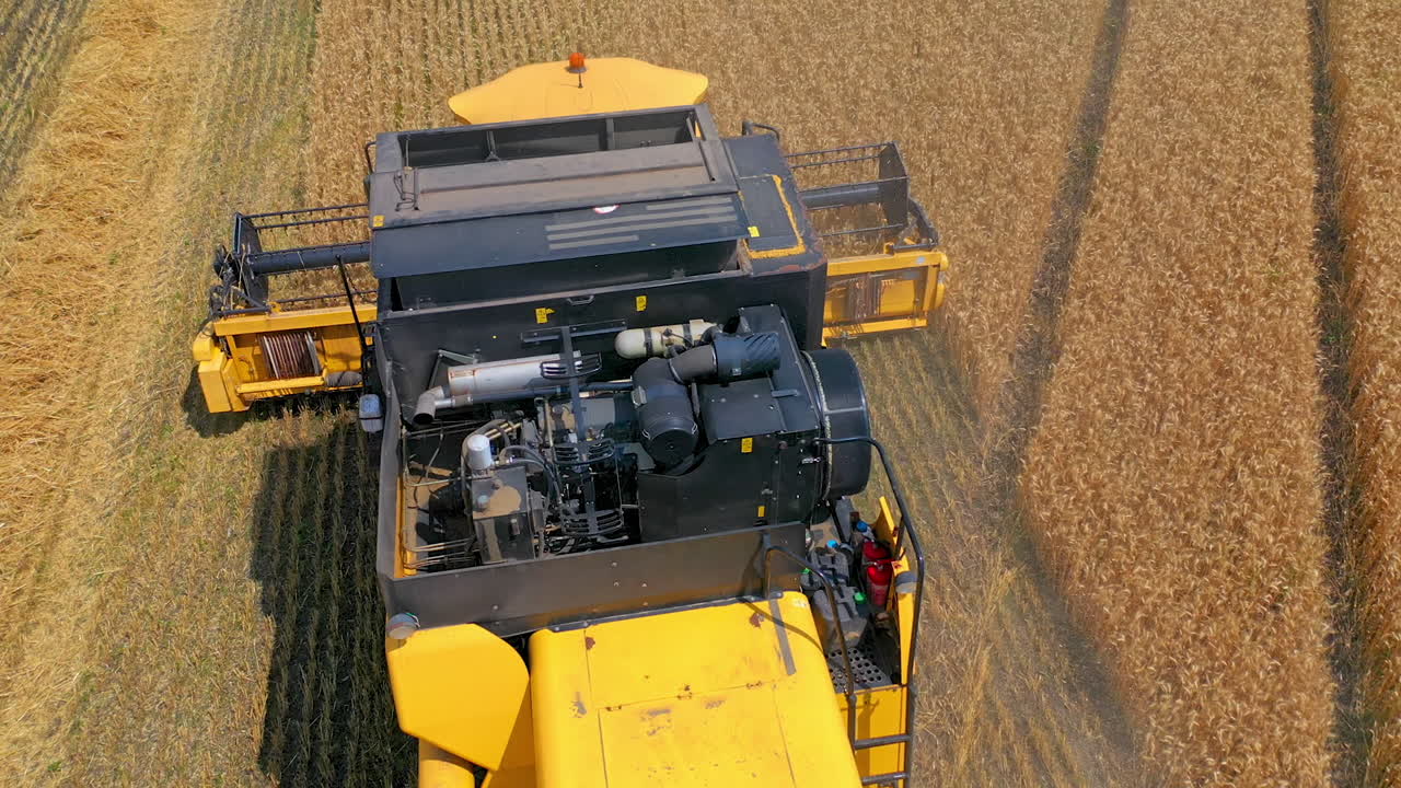Combine harvester in action on the field. Combine harvester. Harvesting machine for harvesting a wheat field.