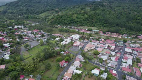 aerial view of a small town nestled in the mountains of costa rica