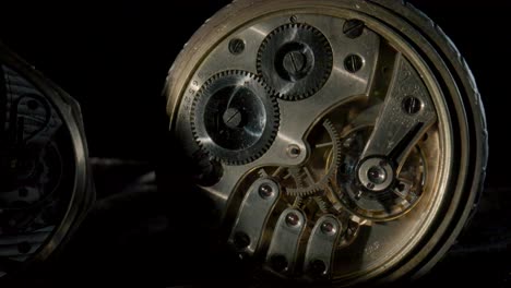 intricate internal mechanism of an antique pocket watch