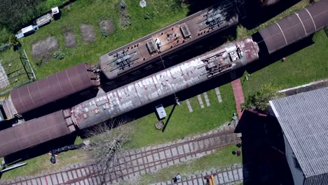 aerial shot abandoned train station in switzerland with drone