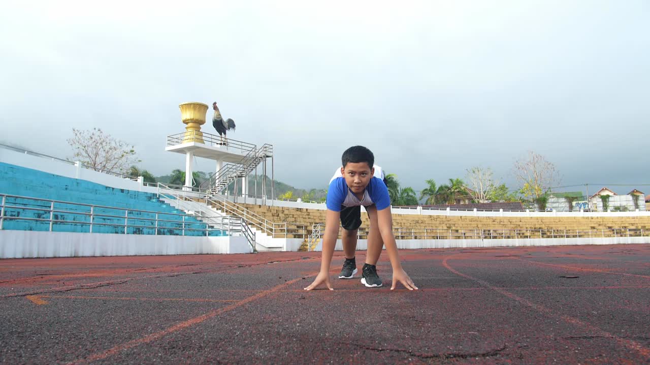 Boy Running From The Starting Point