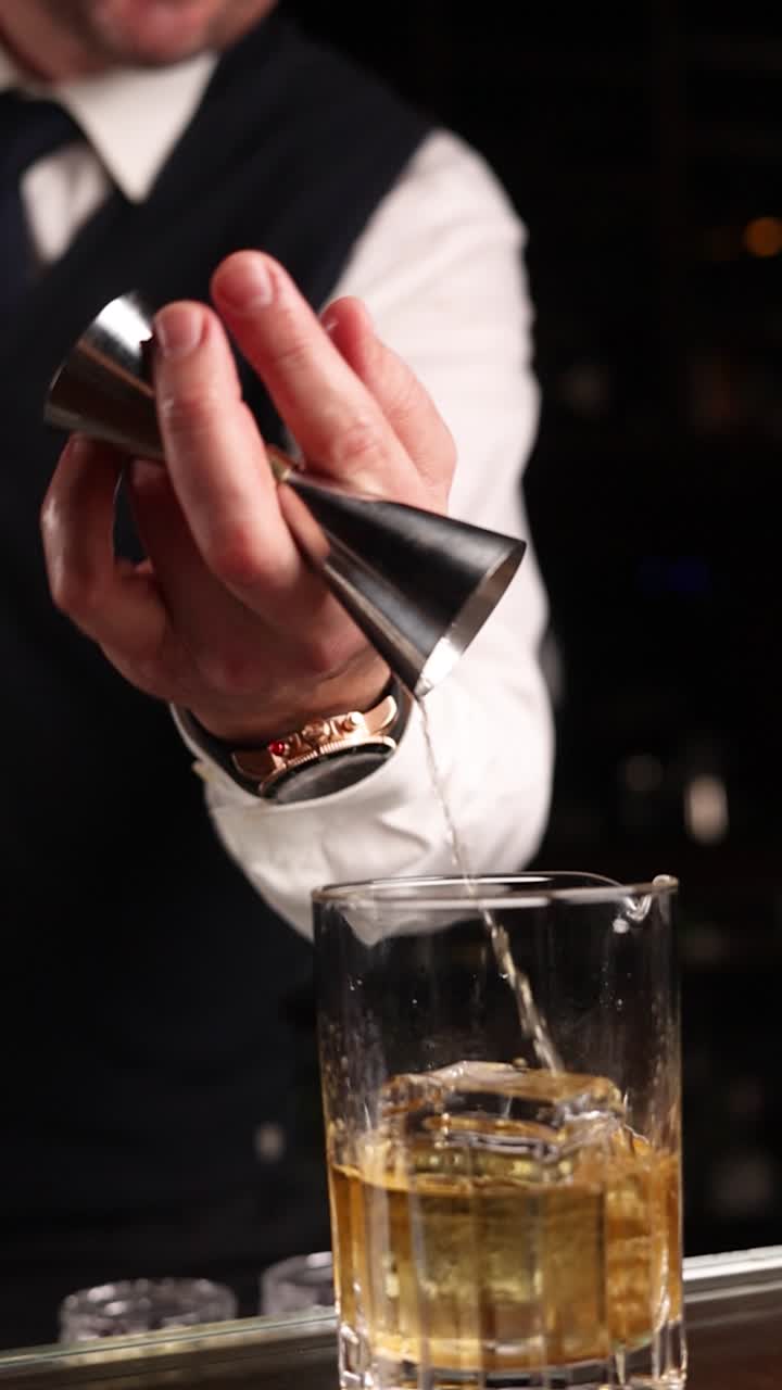 Bartender Preparing a Whiskey Cocktail
