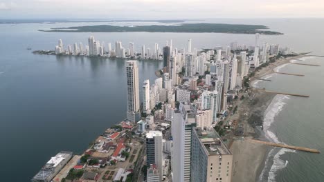 aerial drone view above cartagena bay skyscrapers colombia bocagrande caribbean sea beach town