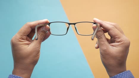 person holding glasses