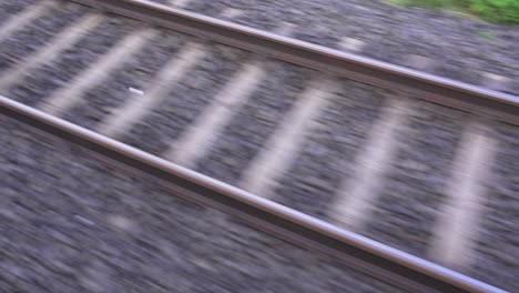 the line next to the fast moving train