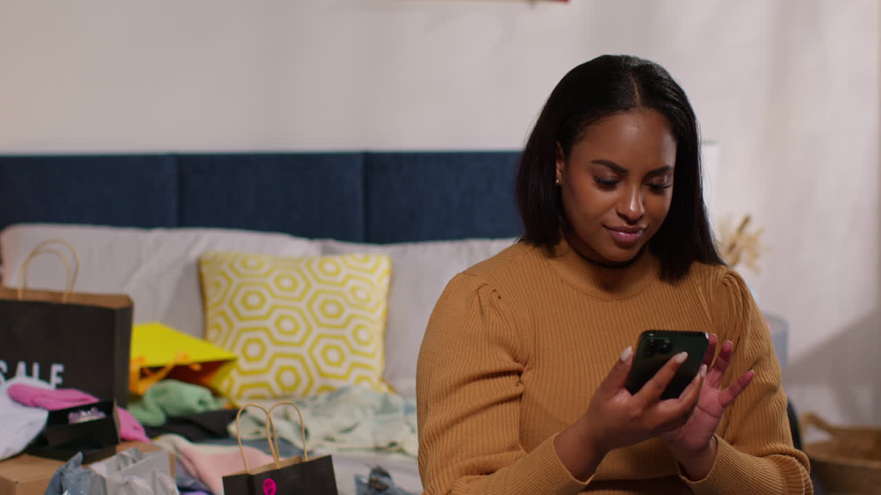 Woman Online Shopping in Bedroom